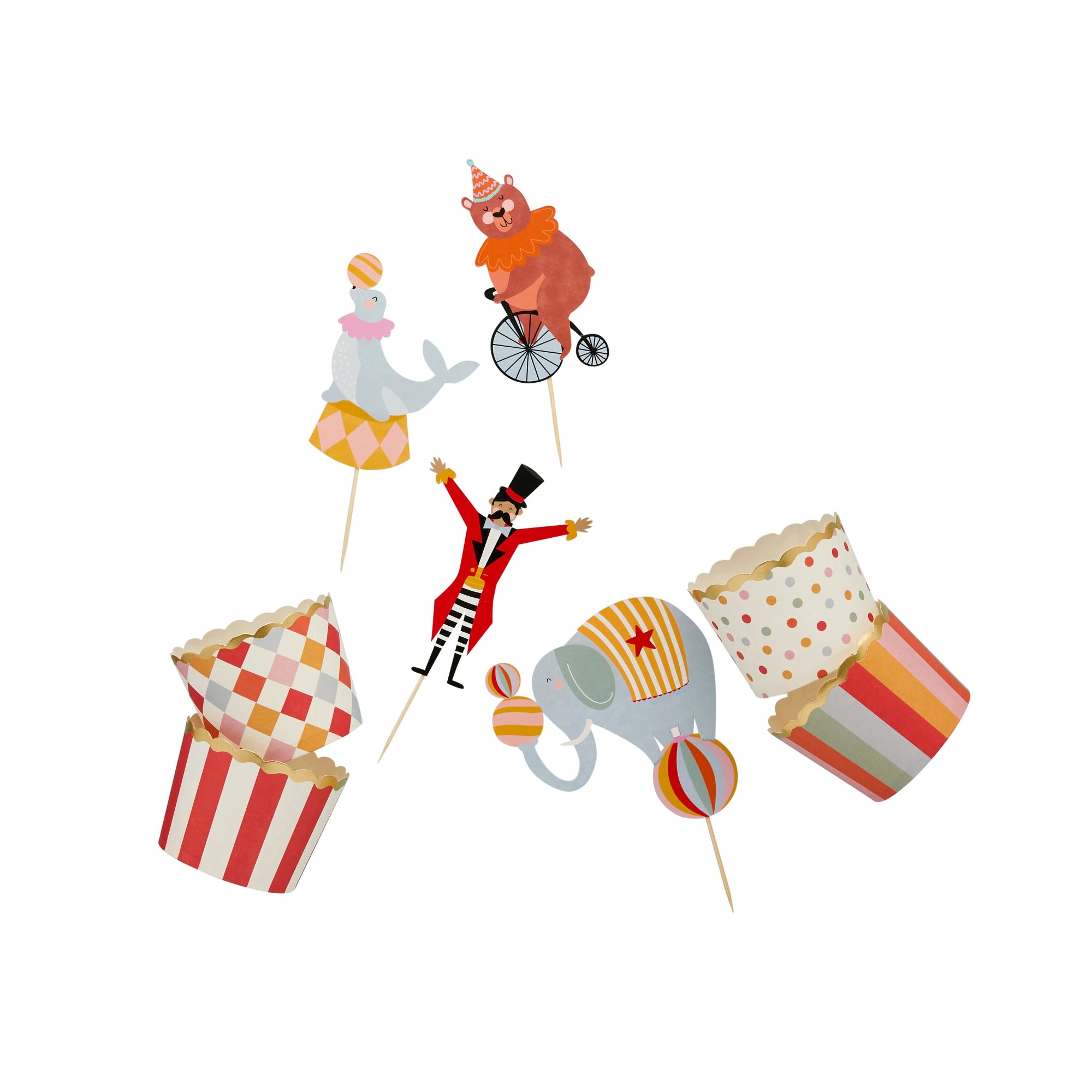 A 12-piece circus snack set featuring character food picks like a unicycle bear and seal, alongside striped, harlequin, and polka-dot treat cups.