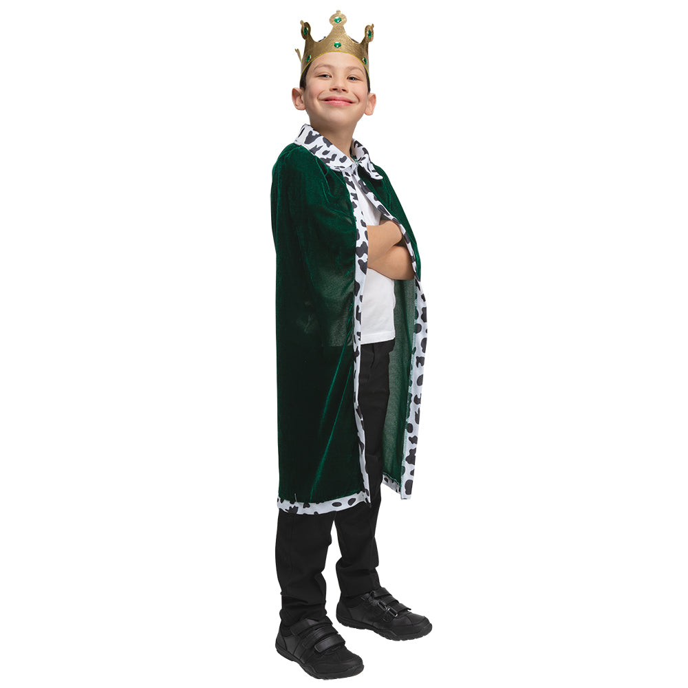 A child models a deluxe green velvet king's robe with Dalmatian-print trim, wearing a gold crown.