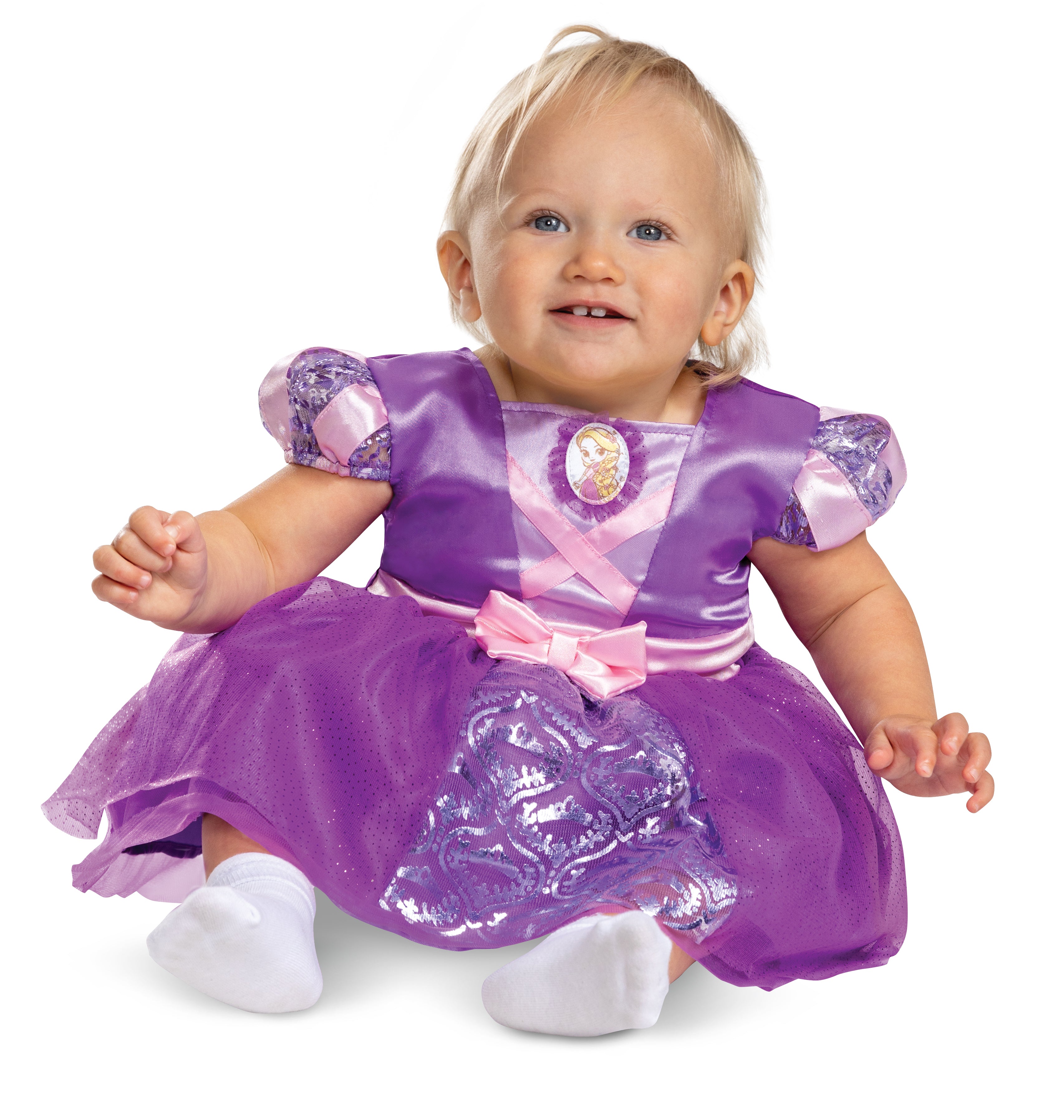Front view of a toddler wearing the official Disney Rapunzel Classic Costume, featuring a purple dress with pink ribbon details and a character cameo.
