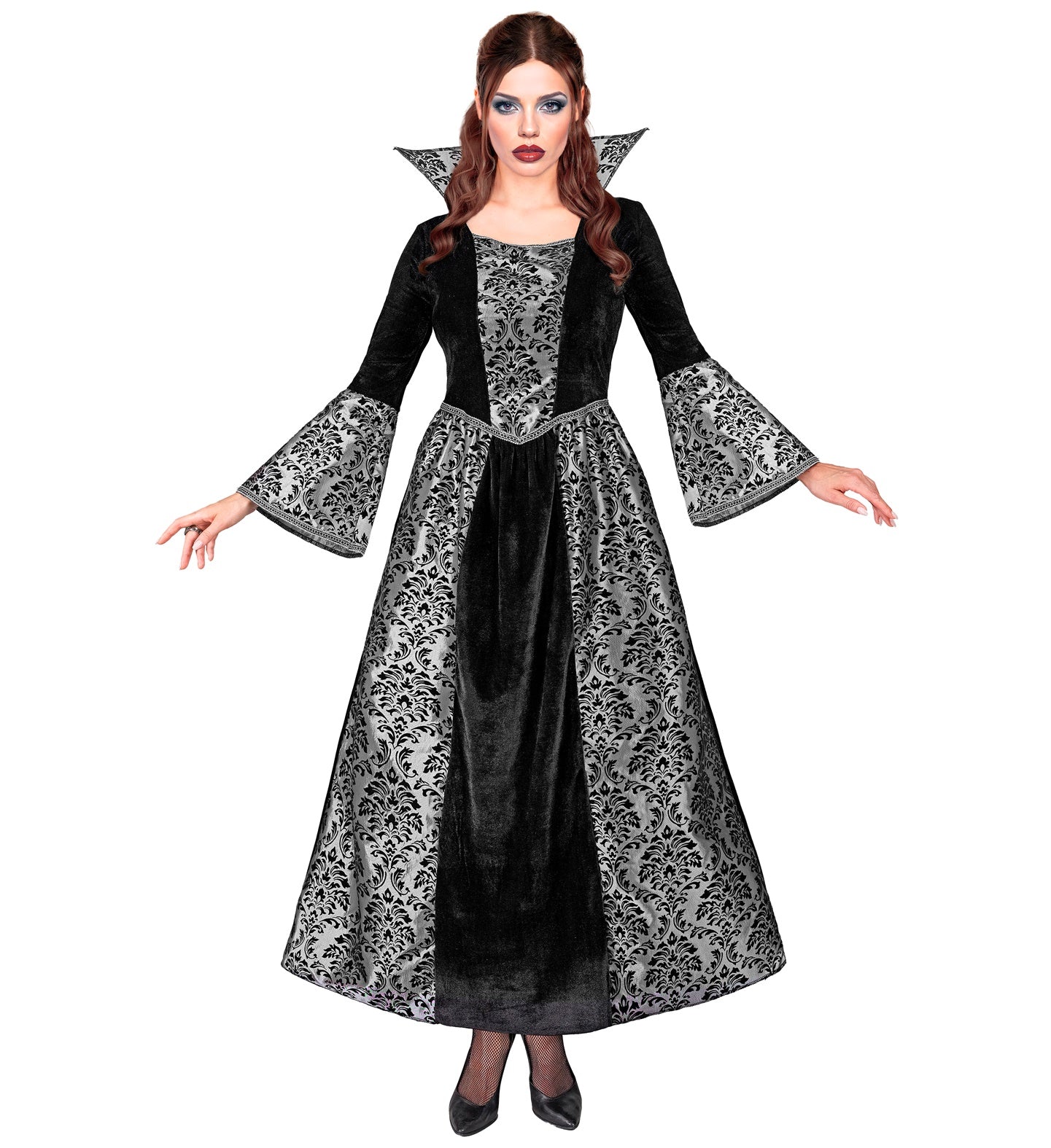 A woman in an elegant vampiress costume, consisting of a full-length black velvet gown with a dramatic collar and silver damask patterned panels on the skirt and sleeves. The person is posing with hands outstretched.