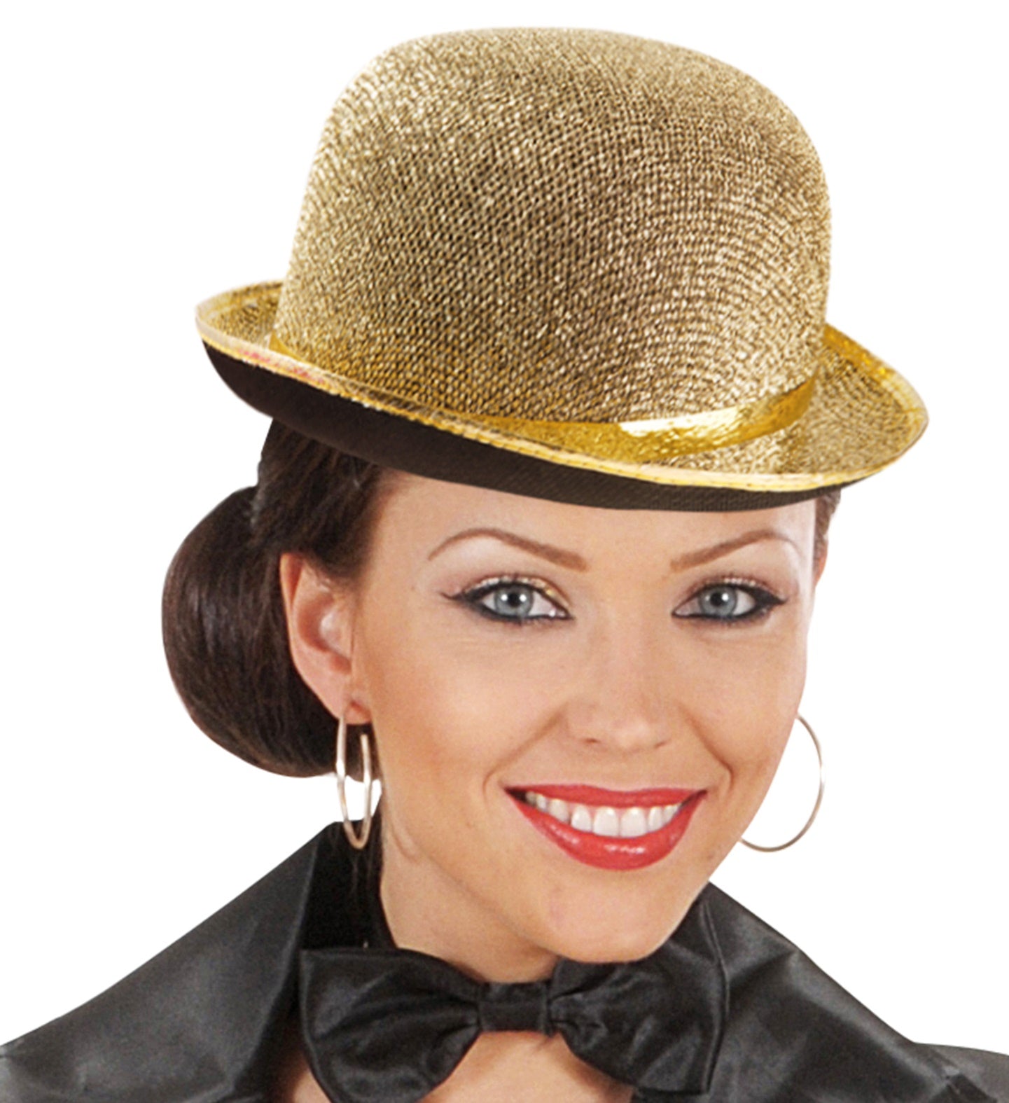 A close-up of a smiling woman wearing a gold glittery felt bowler hat and a black sequin bow tie, against a white background.