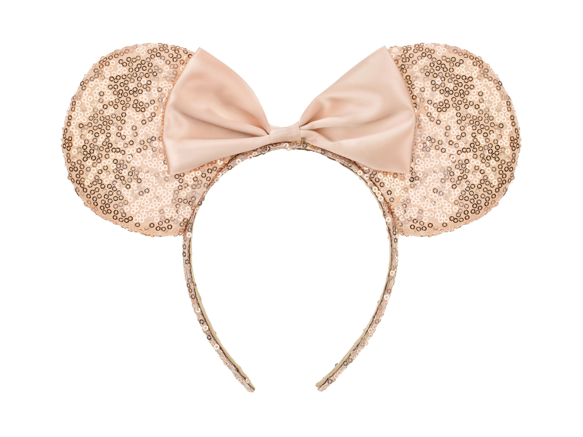 A close-up of a champagne gold headband featuring two large sequined mouse ears and a smooth satin bow in the center, isolated against a white background.