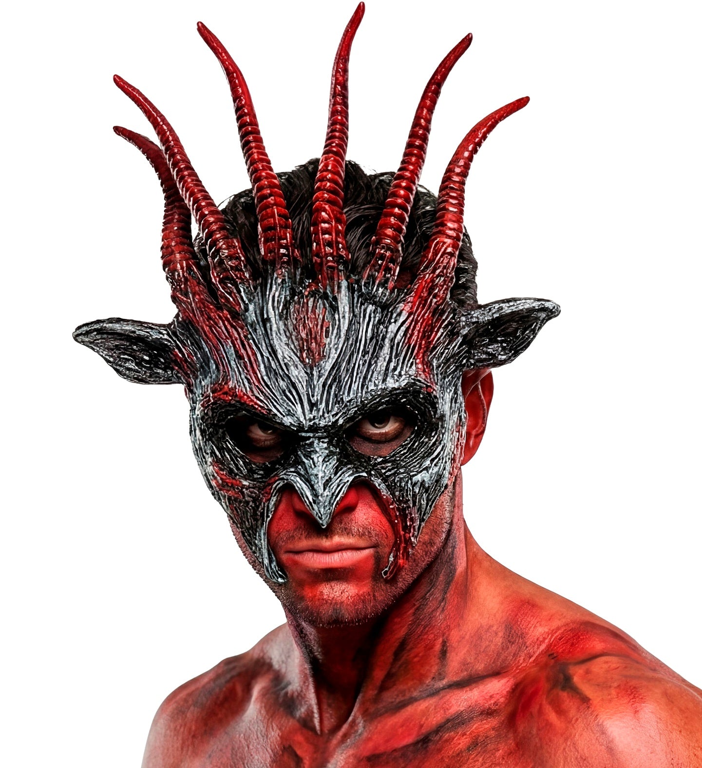 A close-up portrait of a male model covered in red and black demonic body paint, glaring intensely through the eye holes of the textured Infernal Beast mask with six red horns.