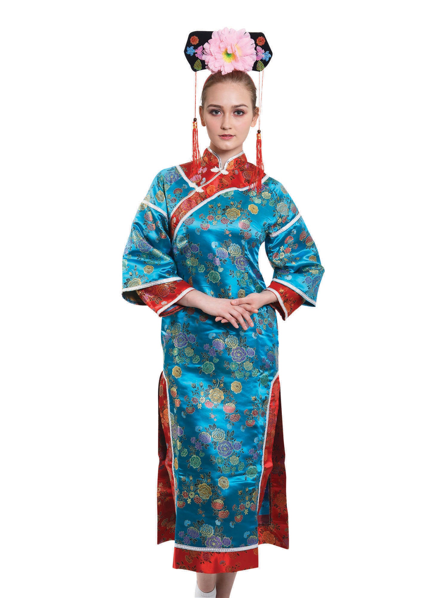 Woman wearing a Japanese Lady Costume, featuring a blue and red embroidered oriental floral dress, and an elaborate black floral headpiece with a large pink flower, a red flower, and hanging red tassels.