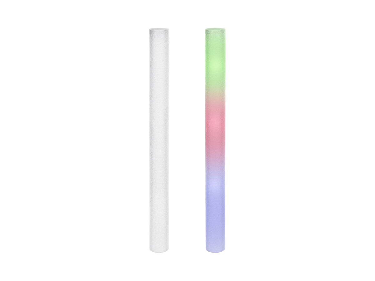 Two slim cylindrical LED glow sticks on a plain white background, one unlit and translucent white, and one lit with a vertical gradient showing green, pink, and blue light.