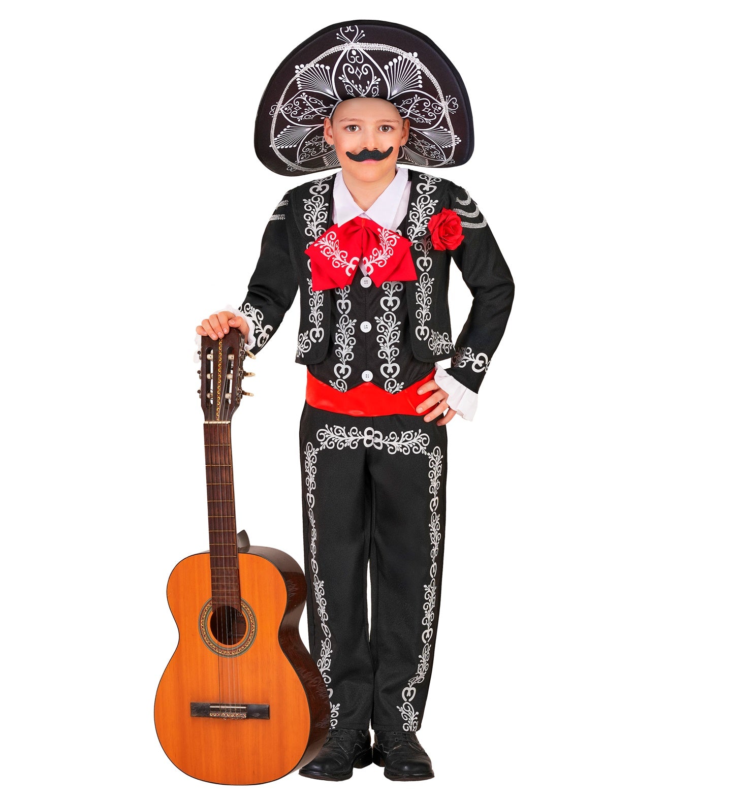 A child posing in a black Mariachi Day of the Dead costume with white detailing, a red bow tie and red waist sash, wearing sugar skull face paint and holding a large wooden acoustic guitar.