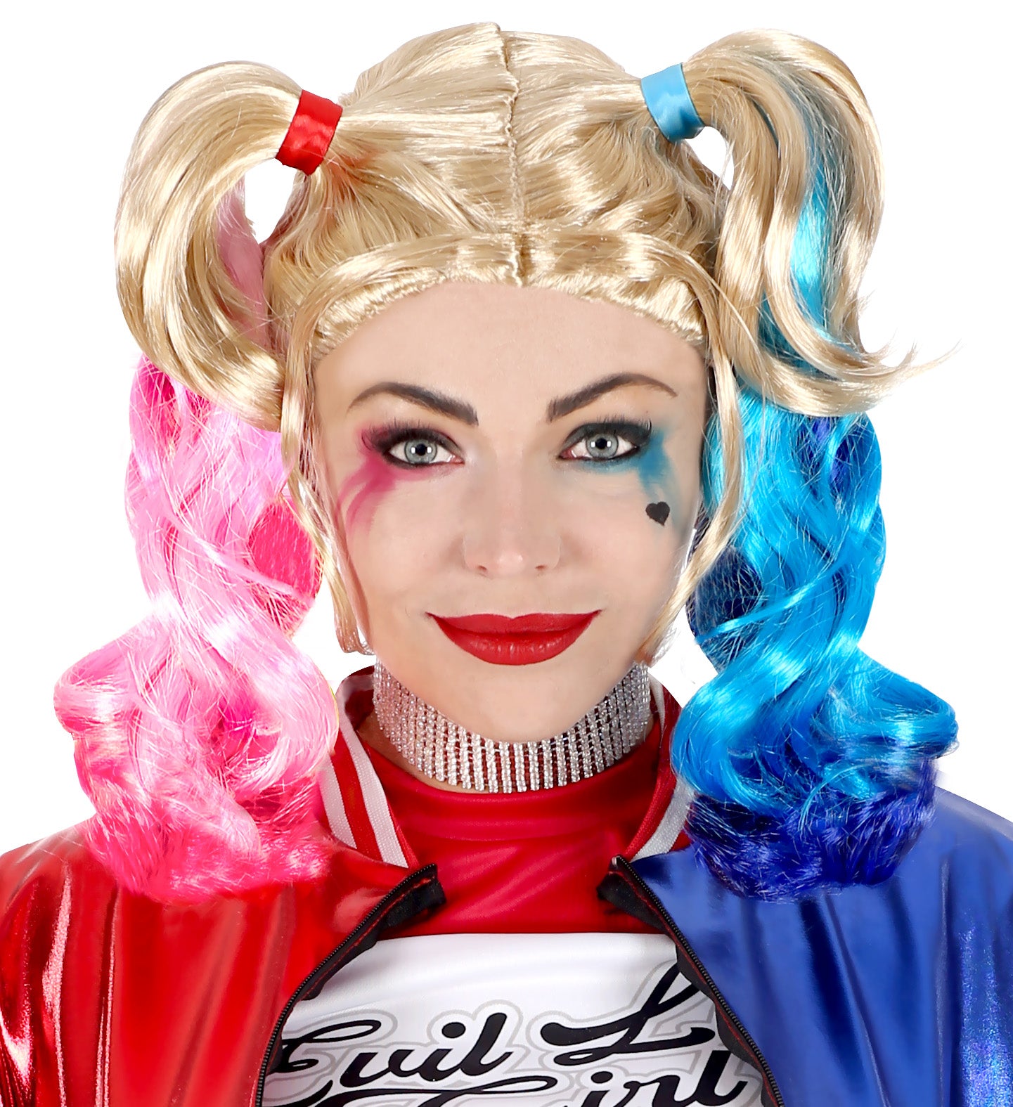 A close-up of a woman in Harley Quinn villain makeup wearing a blonde wig with high pigtails, one dyed pink and the other blue.