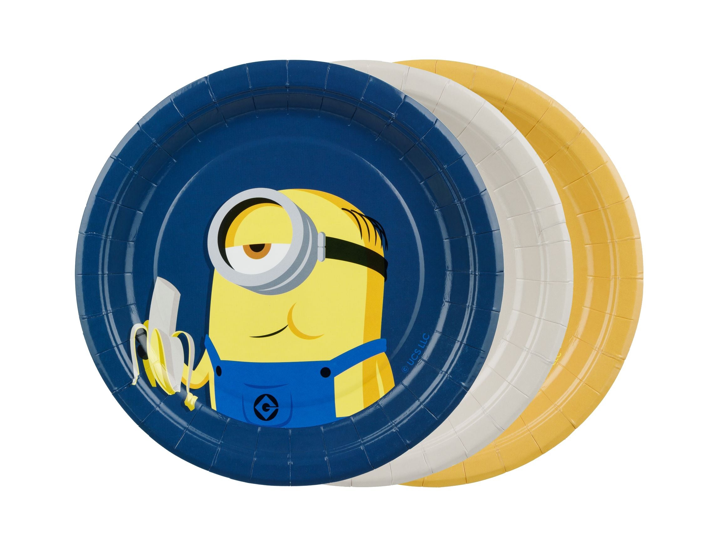 A fanned-out stack of three round Minion paper plates showing a blue plate on top with a Minion peeling a banana, resting over a beige plate and a yellow plate.