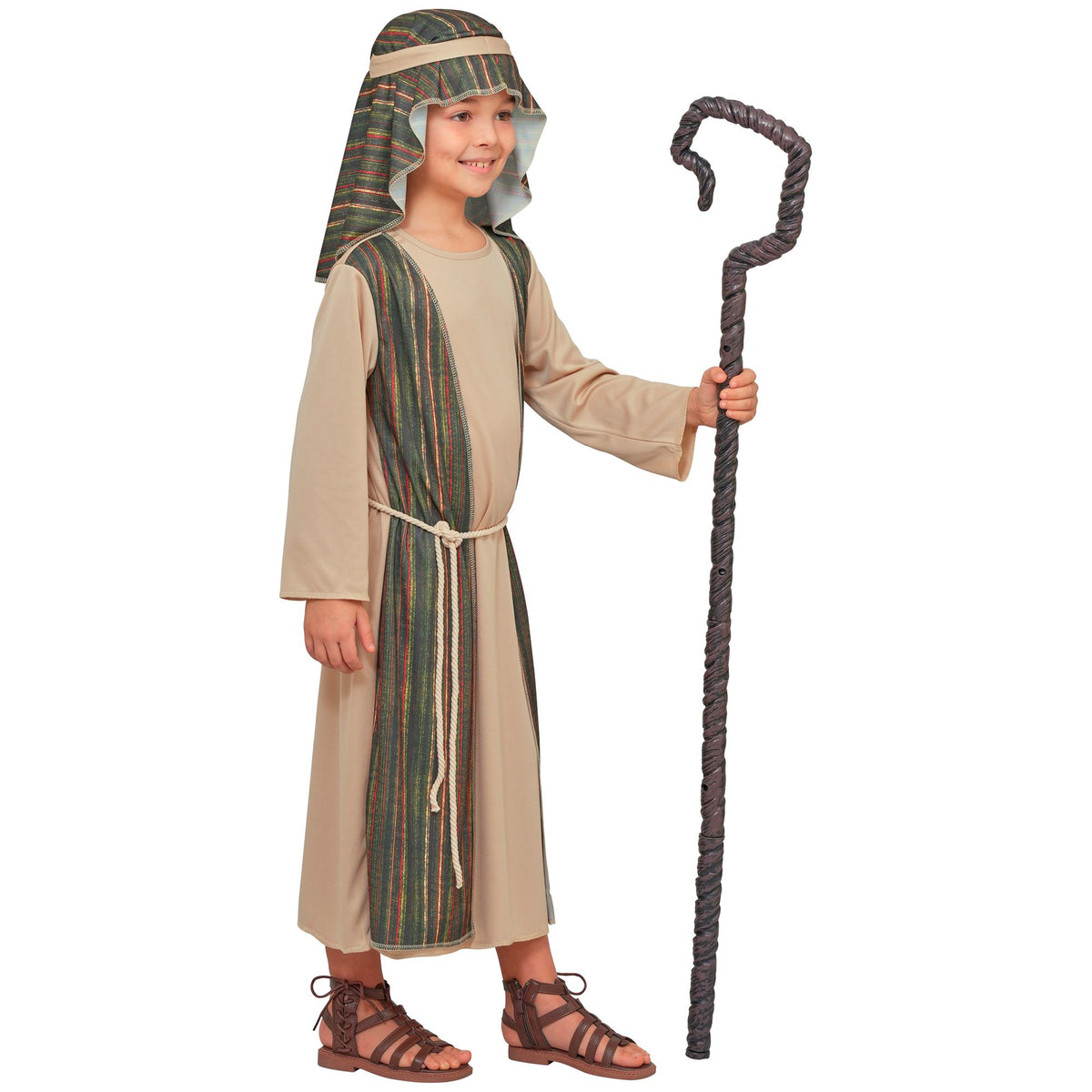 Side profile Child wearing green shepherd costume holding staff, showing headpiece detail and full costume fit