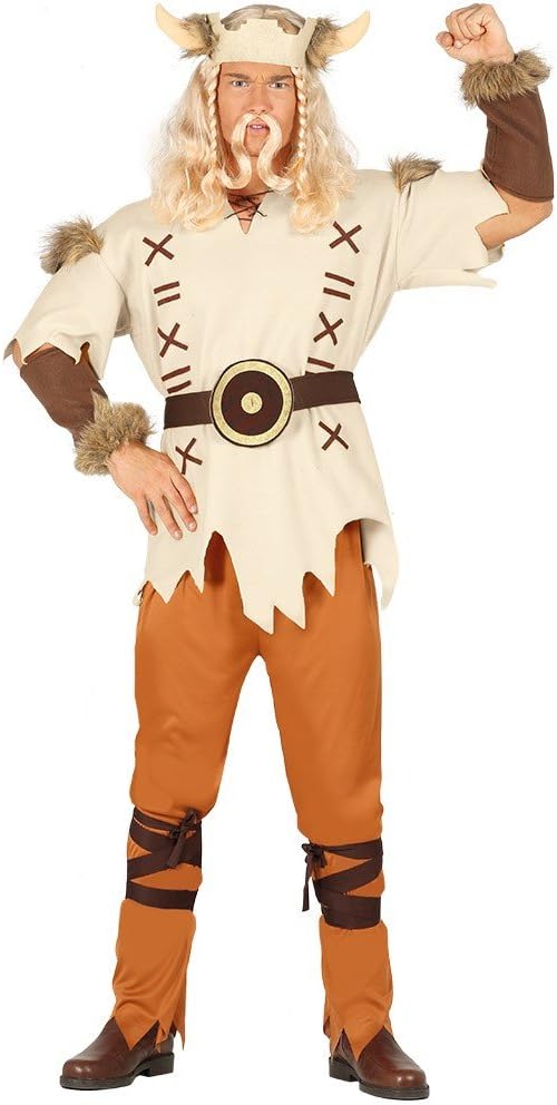 A man posing proudly in a Norse Viking fancy dress costume, wearing a tan ragged-hem tunic with brown cross-stitch details and faux fur shoulder pads, brown trousers with attached leg wraps, a large statement belt, fur-trimmed wrist cuffs, and a soft horned headband.