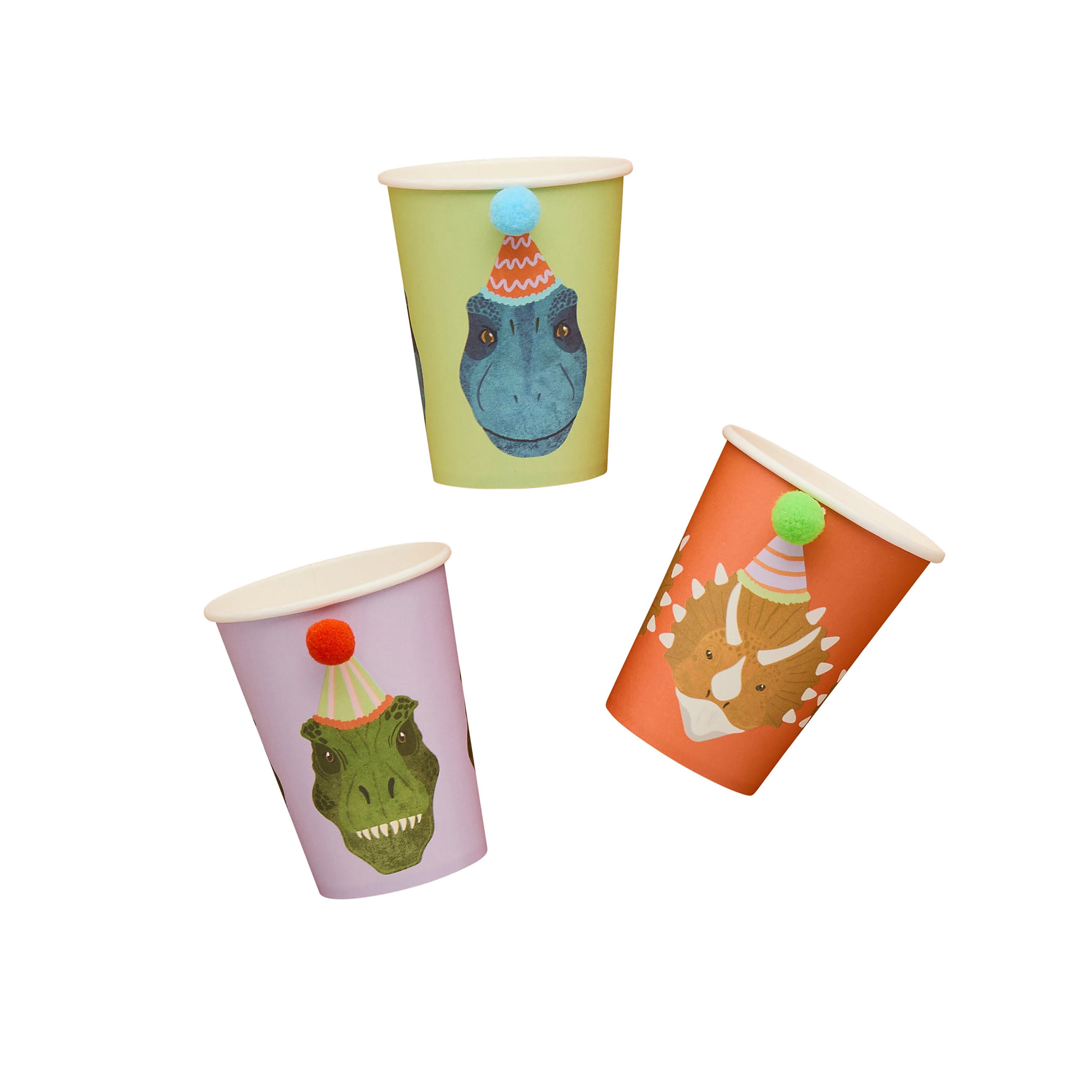 Three paper cups in orange, lavender, and green, each featuring a dinosaur character wearing a 3D pom-pom party hat.