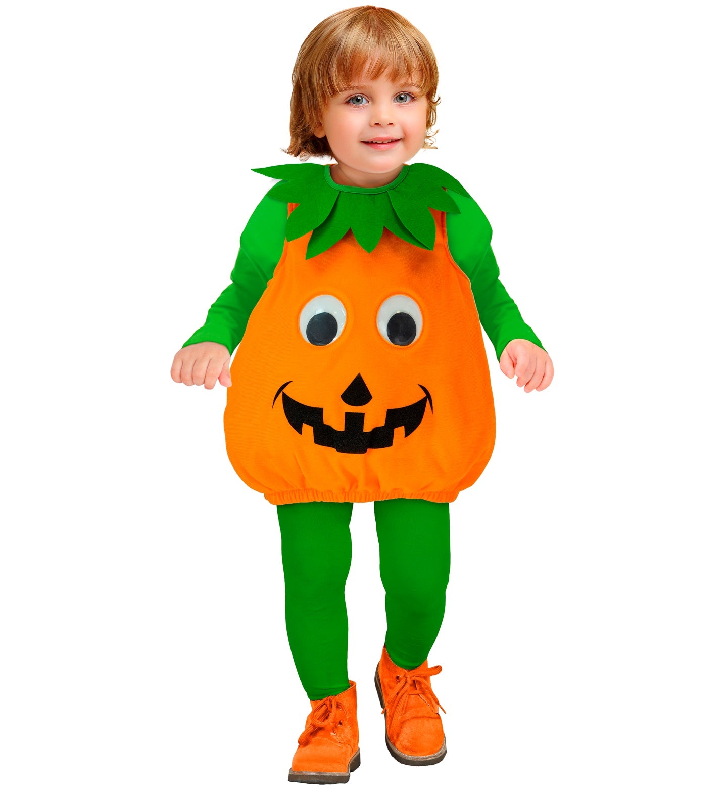 A child in a pumpkin costume, consisting of a large, orange, jack-o'-lantern-shaped jumpsuit with a green collar, a long-sleeved green shirt, and green leggings. The child is smiling and standing on a white background.