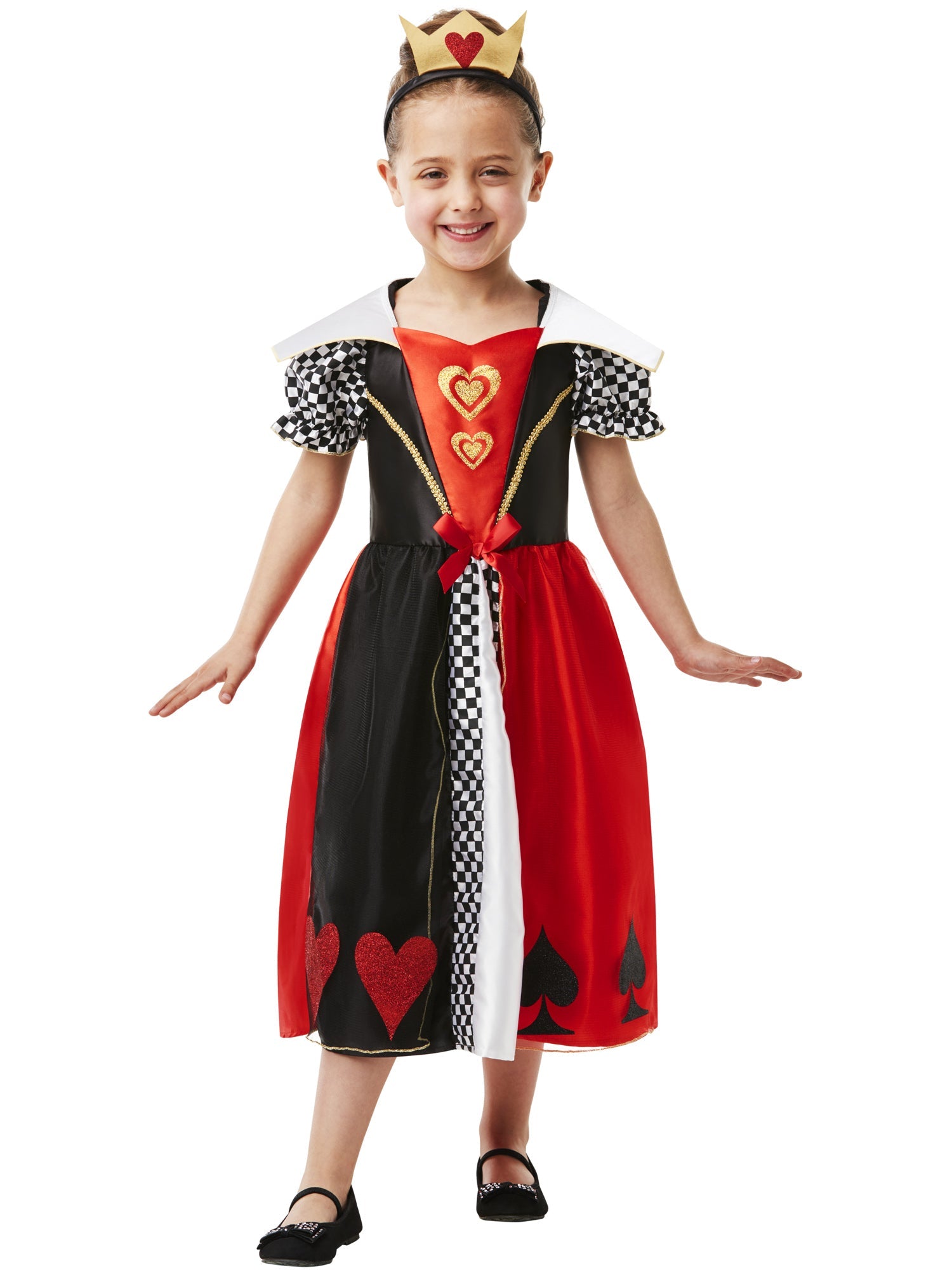 Happy child posing as the Queen of Hearts in a Wonderland-themed dress with card suit symbols.