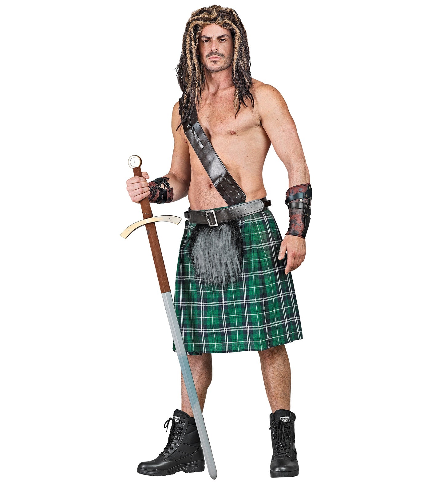 A man dressed in a fierce Scottish warrior costume, featuring a green tartan kilt with a grey plush purse, a black leather belt, a chest strap, arm cuffs, and holding a large prop sword.