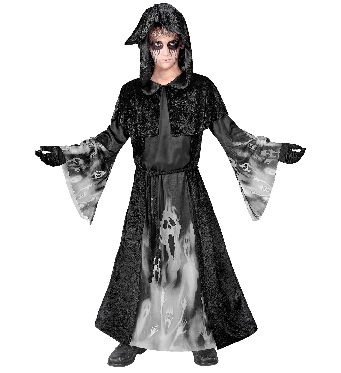 A child in a black, hooded robe with a white print of screaming ghostly faces, with a capelet and rope belt, posing with arms outstretched.