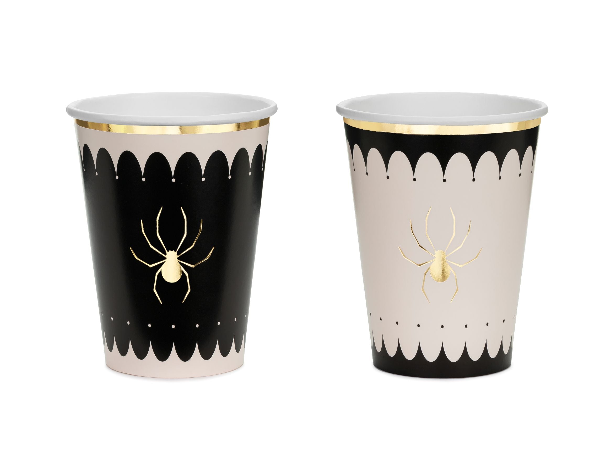 A set of two Halloween themed party cups: one black with a gold spider print and a beige scalloped top border, and one beige with a gold spider print and a black scalloped top border, both featuring a thin gold rim and isolated on a white background.