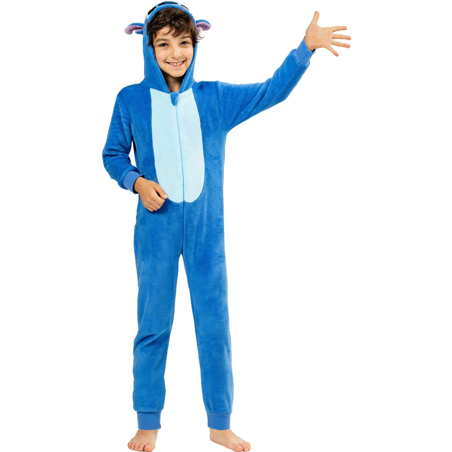 A smiling child standing and happily waving one hand, modeling a soft blue hooded Stitch onesie costume with a light blue belly patch and comfortable ribbed ankle cuffs.