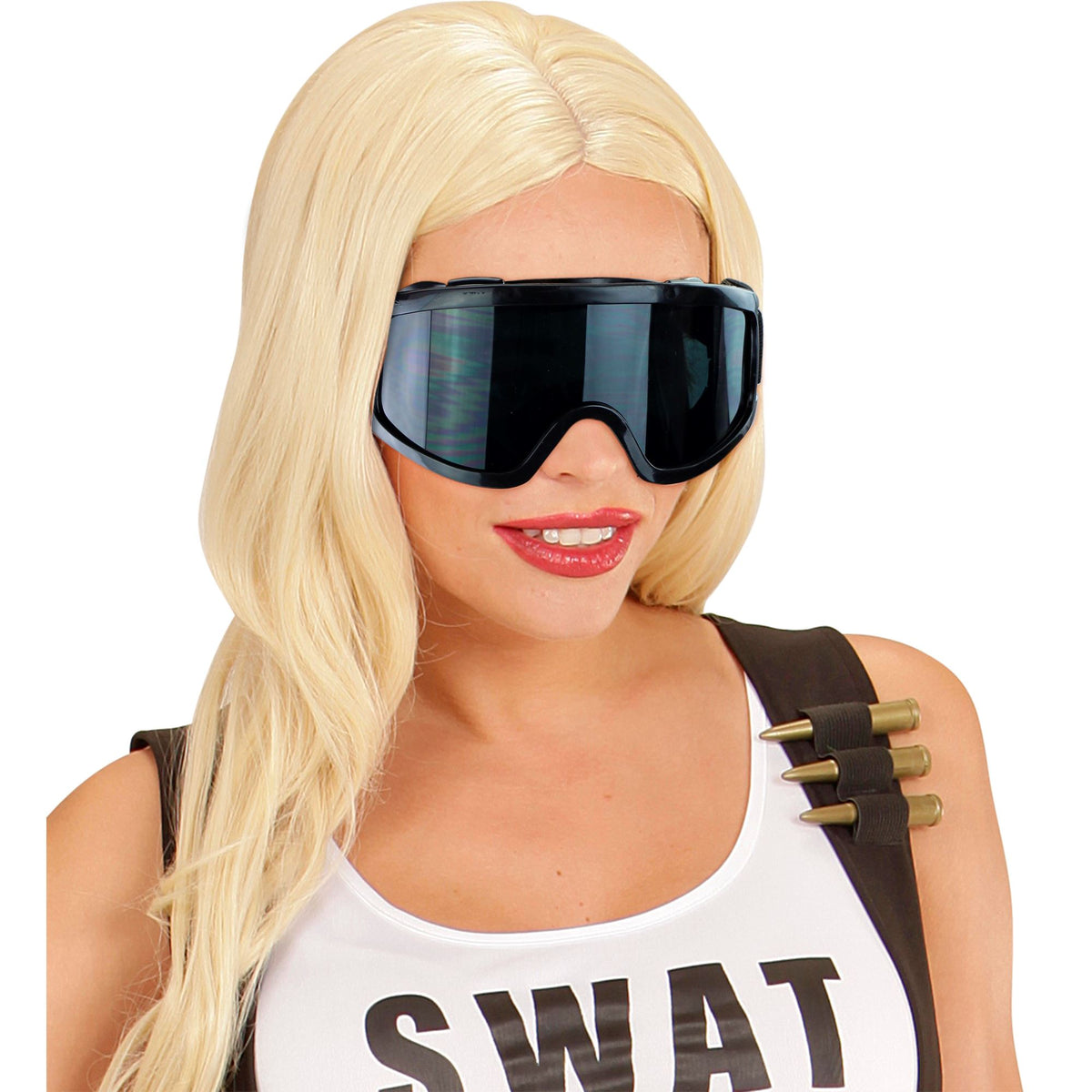 Adult wearing black wrap-around tactical goggles with dark lenses and adjustable straps, paired with futuristic costume styling and blonde wig