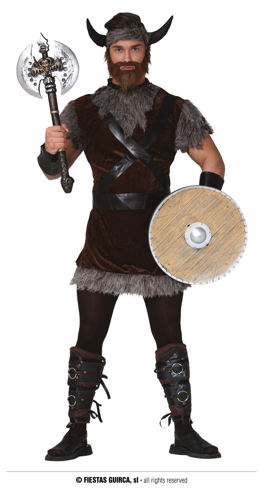 A man posing fiercely in a Viking Raider fancy dress costume, wearing a brown tunic with grey faux fur trim and black crossing chest straps, matching wrist cuffs, and a faux fur headband with black horns. He is holding a prop toy axe and a round wooden-look shield.