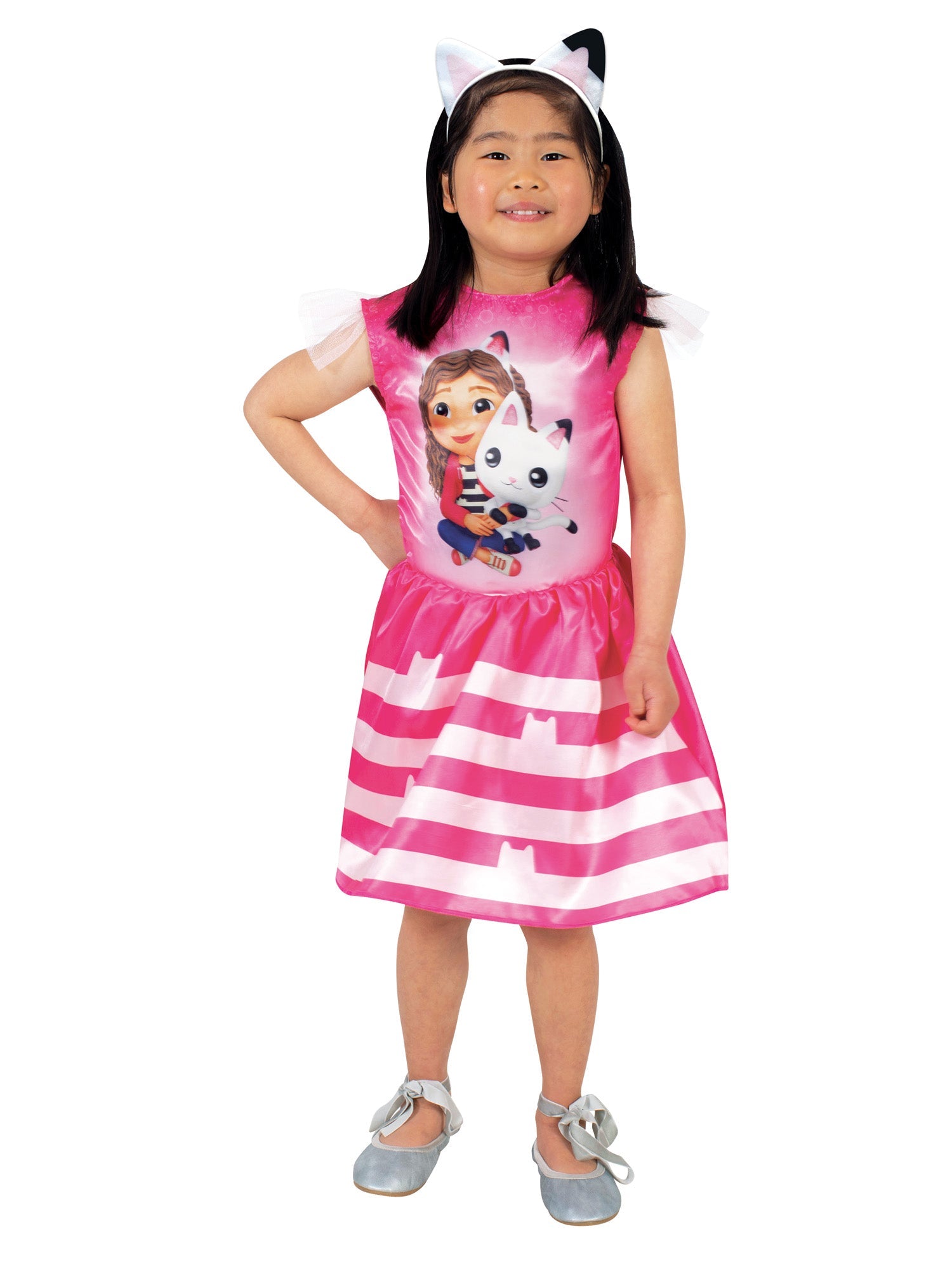 Child wearing a Gabby's Dollhouse pink and white striped dress with a cartoon character on a white background