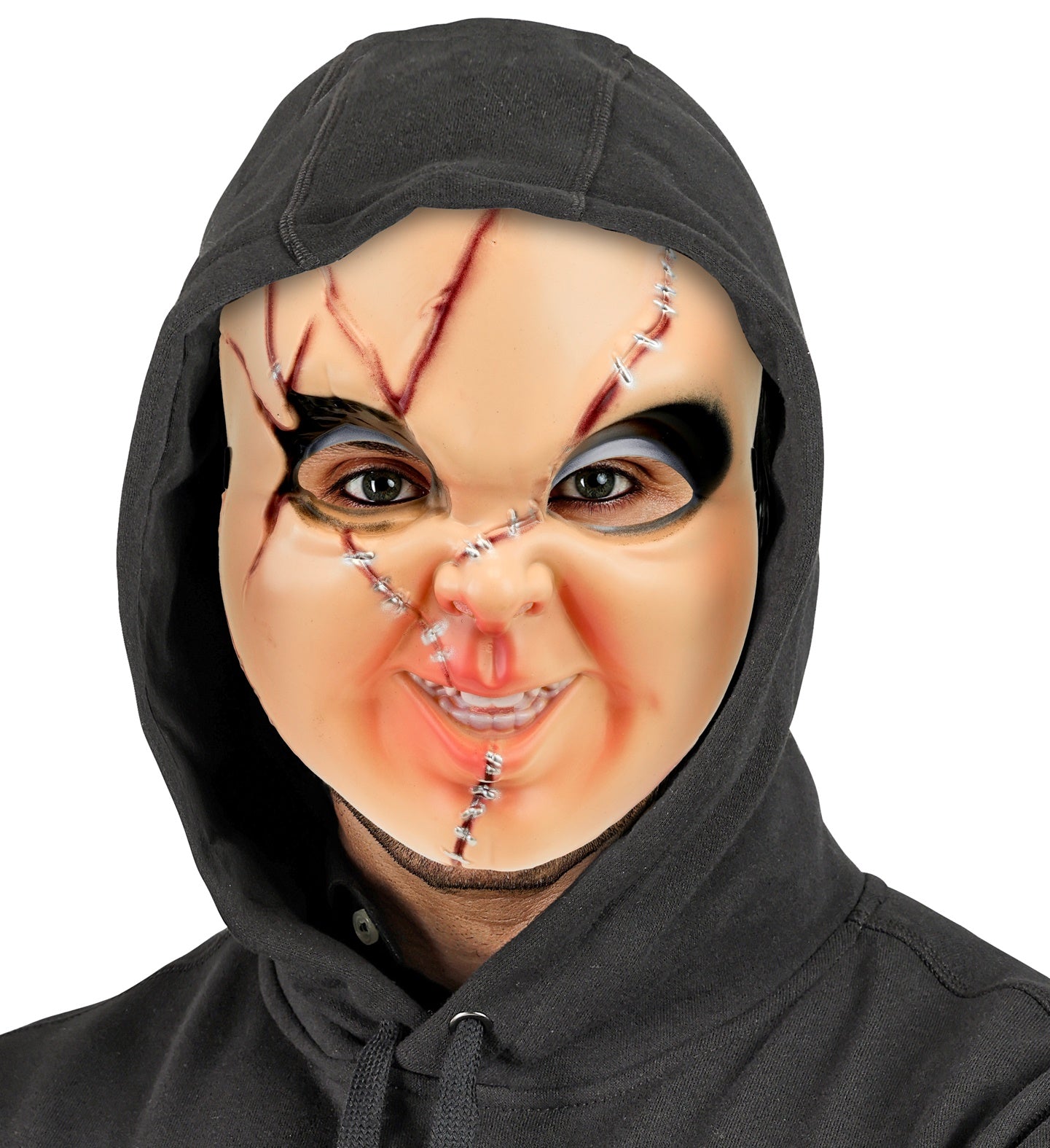 A close-up portrait of a person wearing a terrifying scarred doll hard plastic mask with a creepy smile and metallic stitches, styled with a dark black hoodie pulled over their head.