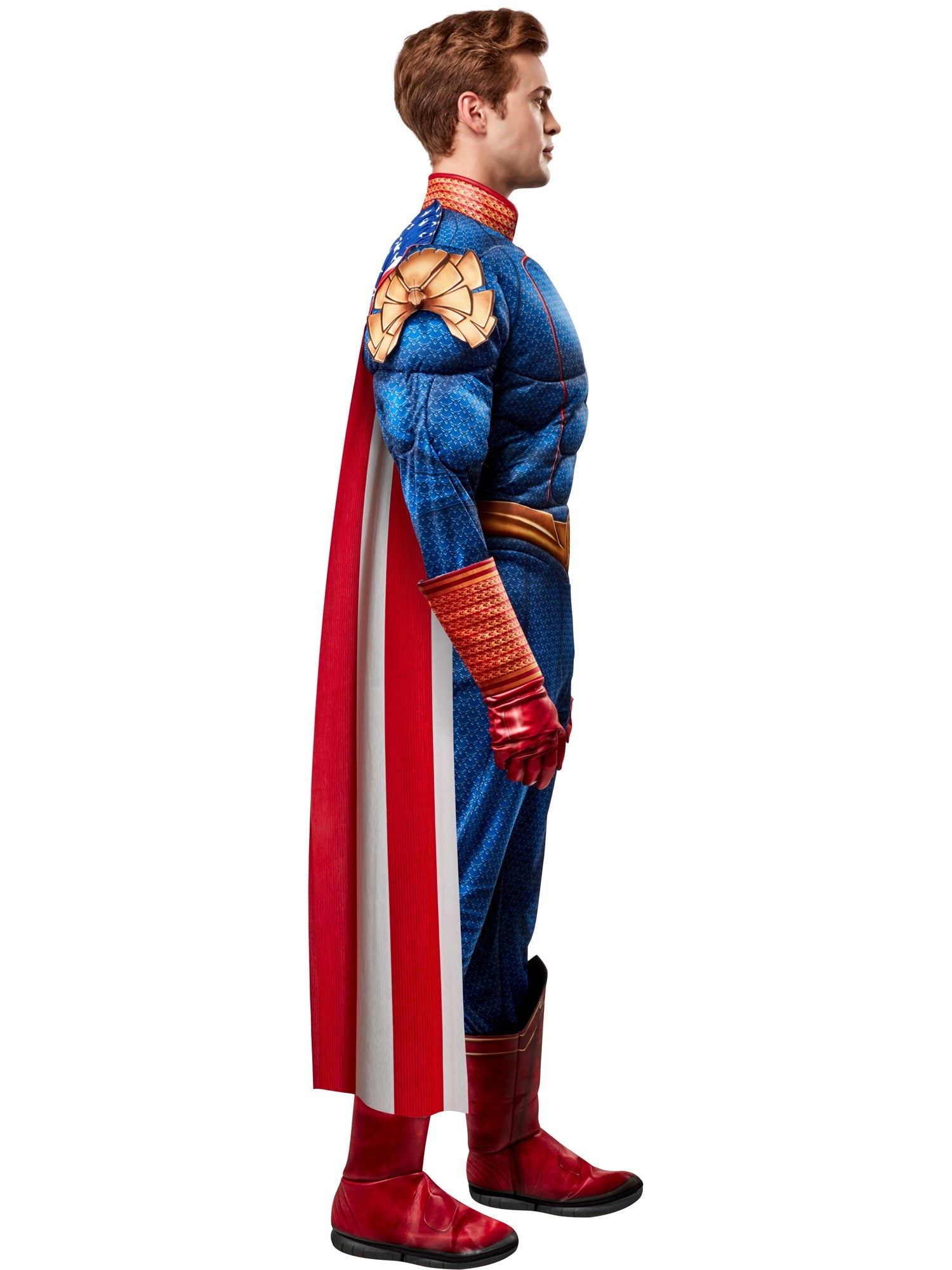 A side profile of a person in a Homelander costume, showing the blue and red bodysuit with gold accents and the American flag-themed cape.