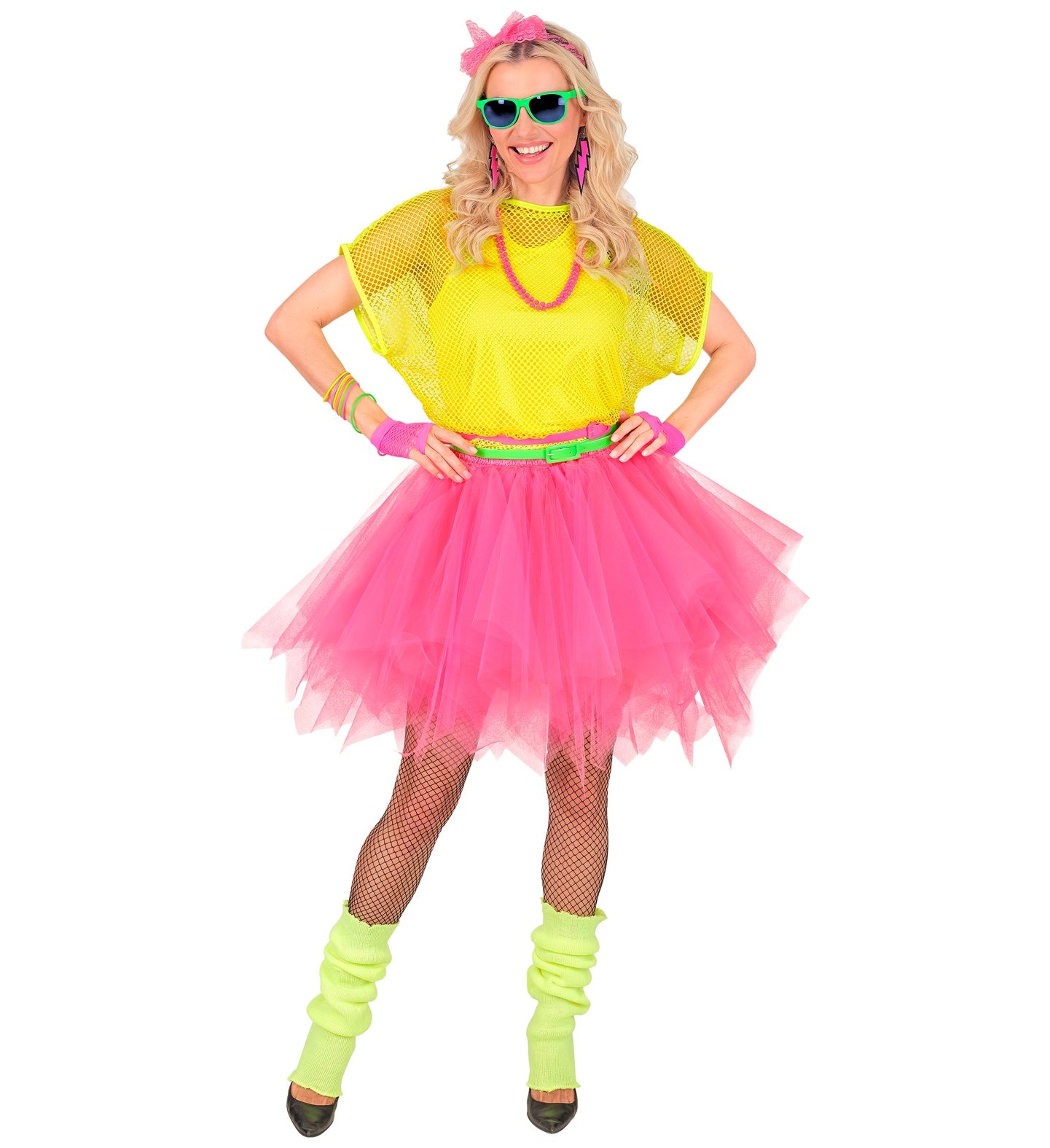 Woman in a full 80s neon outfit, including a yellow mesh top, fishnet tights, green leg warmers, and the neon pink layered tutu skirt.