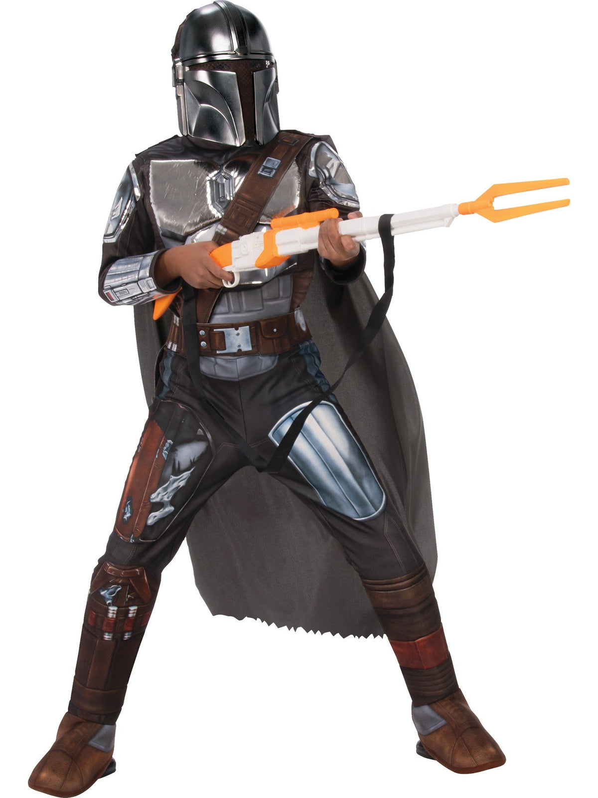 A child modelling the officially licensed Star Wars Mandalorian costume in a wide stance, wearing a detailed printed jumpsuit featuring silver Beskar armour plates, a dark cape, and the iconic silver and black character mask, while holding a toy blaster rifle.