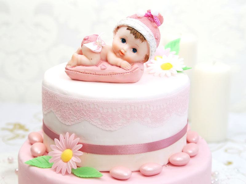 Baby Girl with Pillow on cake